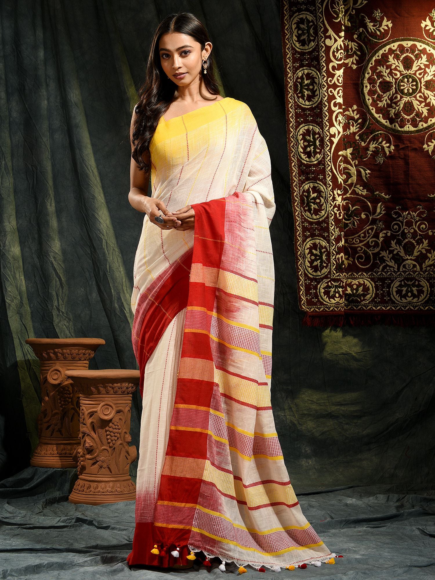 Off White Pure Cotton hand woven saree with Red and Yellow border